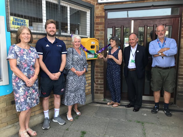 Network Homes' Regeneration Manager and partners at the Sele Farm defibrillator unveiling