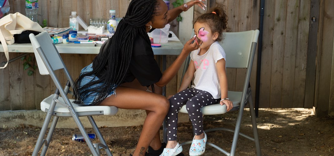 Face painting in the sunshine