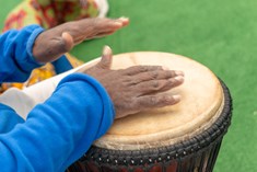 Close up of hands on drums