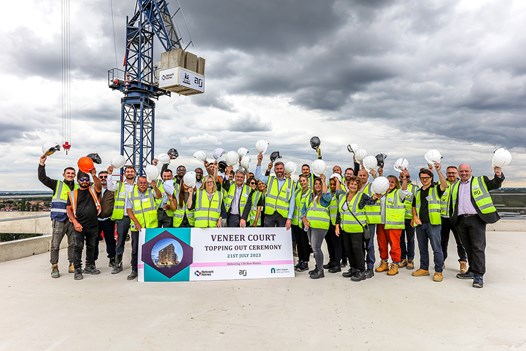 Group shot at topping out ceremony