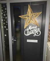 Front door with Merry Christmas decoration